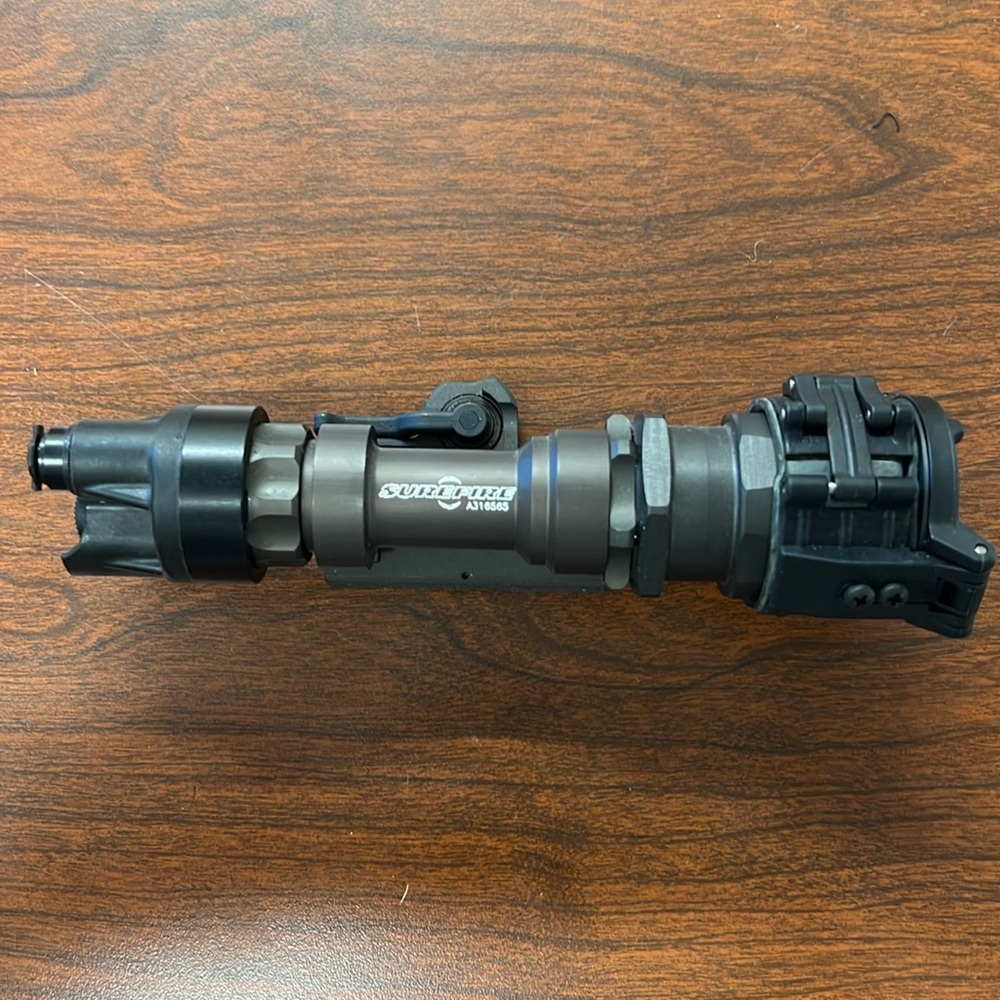 Surefire Weapon Light with rail adapter and IR light Cover